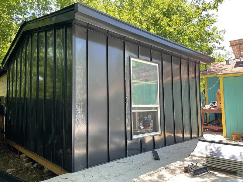 Black standing seam metal wall panels for Roof Inspection in North Salem