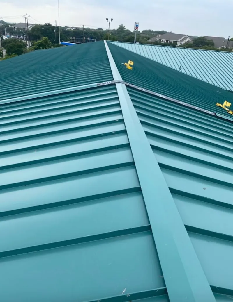 Green commercial metal roof ridge and valley for Metal Roof Repair in North Salem