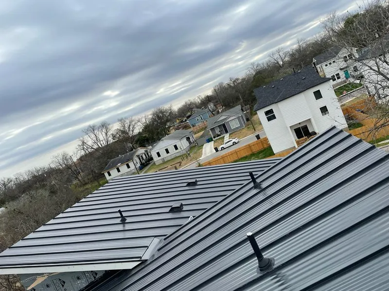 Standing seam metal roof panels with vents for Skylight Repair in North Salem